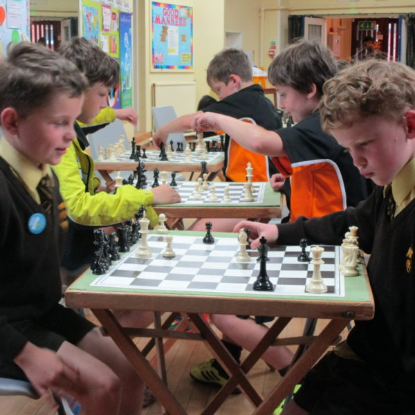 Boys playing chess – chess club
